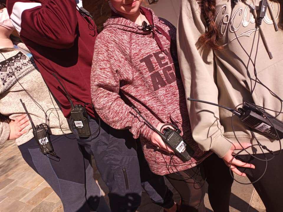 Student filmmakers with Over N Out walkie talkies